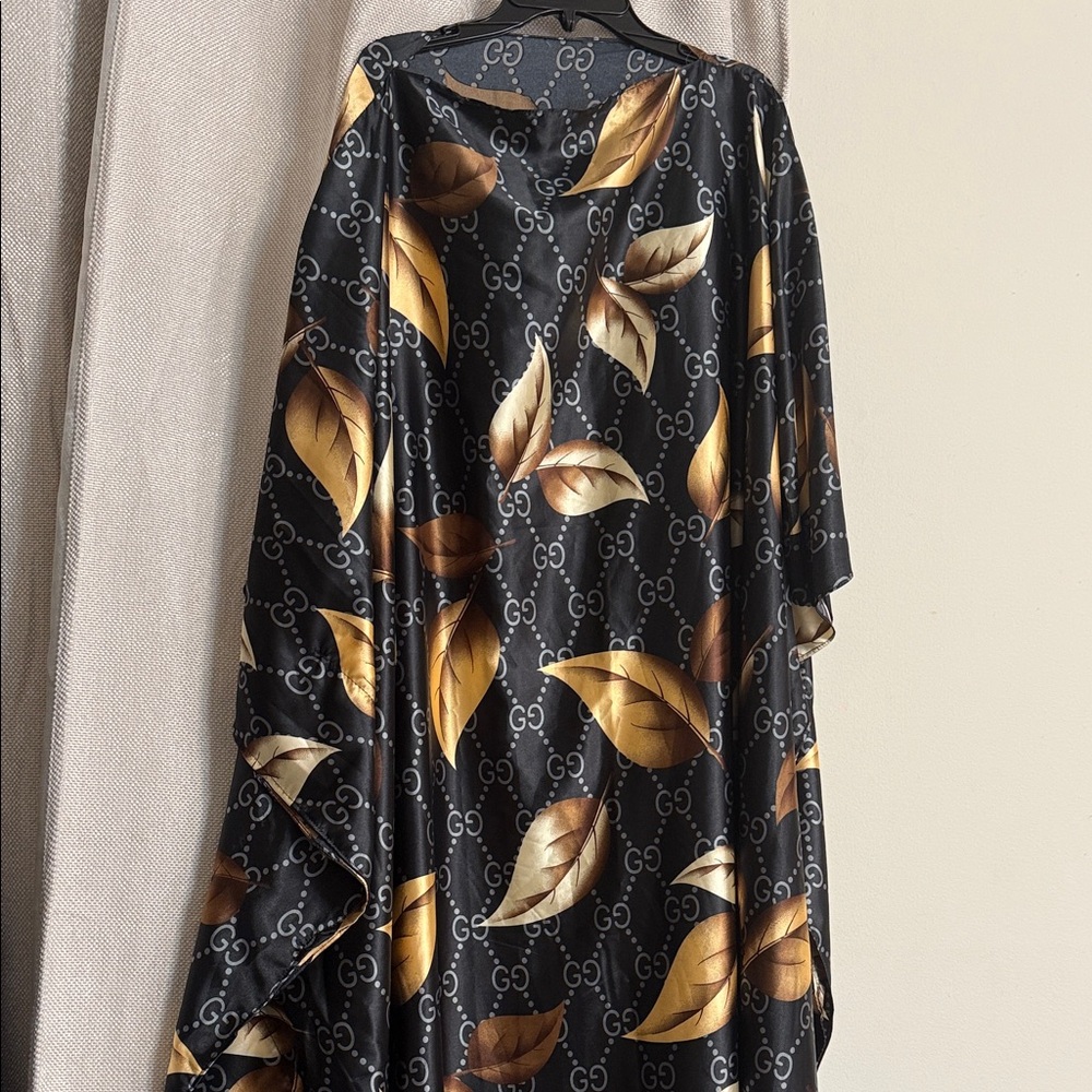 Brand new Black and Gold Leaf Print Kaftan dress